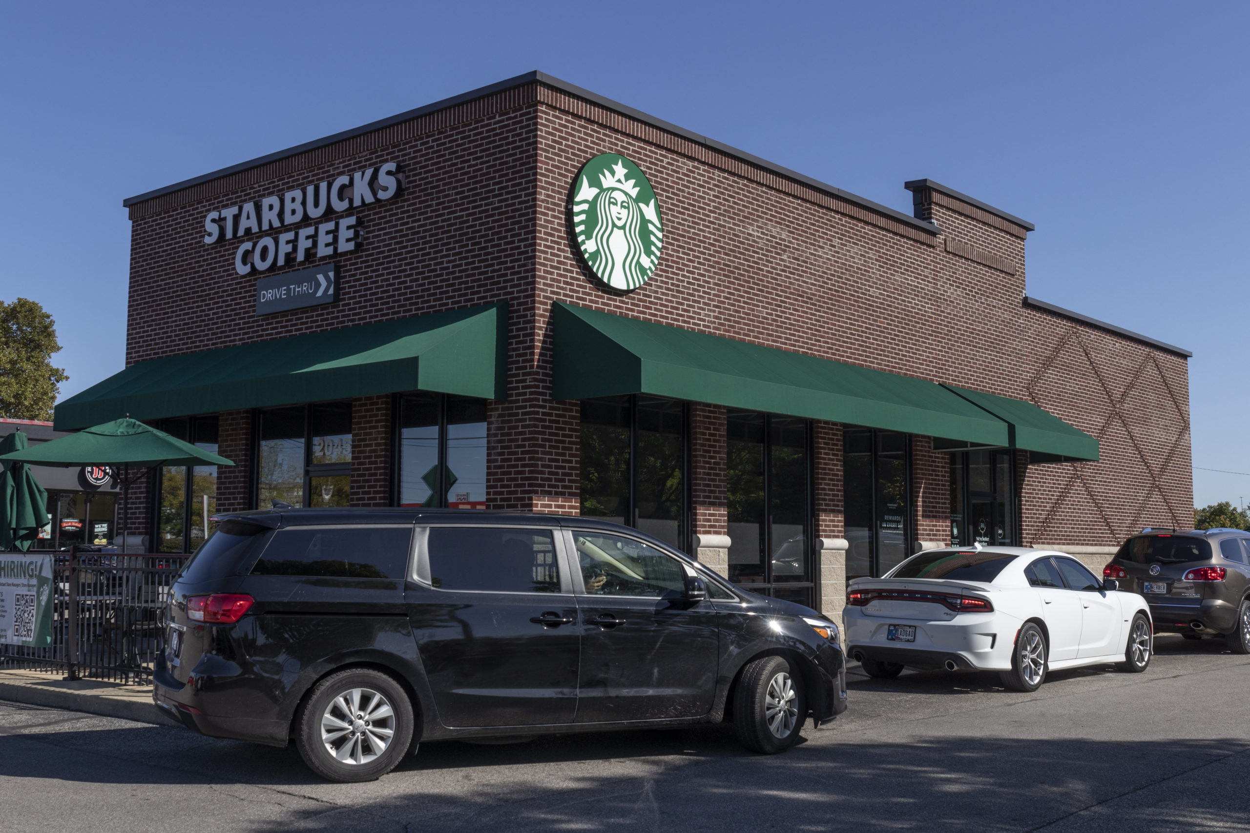 Indianapolis - Circa October 2021: Starbucks Retail Coffee Store. Each year, Starbucks celebrates Fall with Pumpkin Spice Lattes.