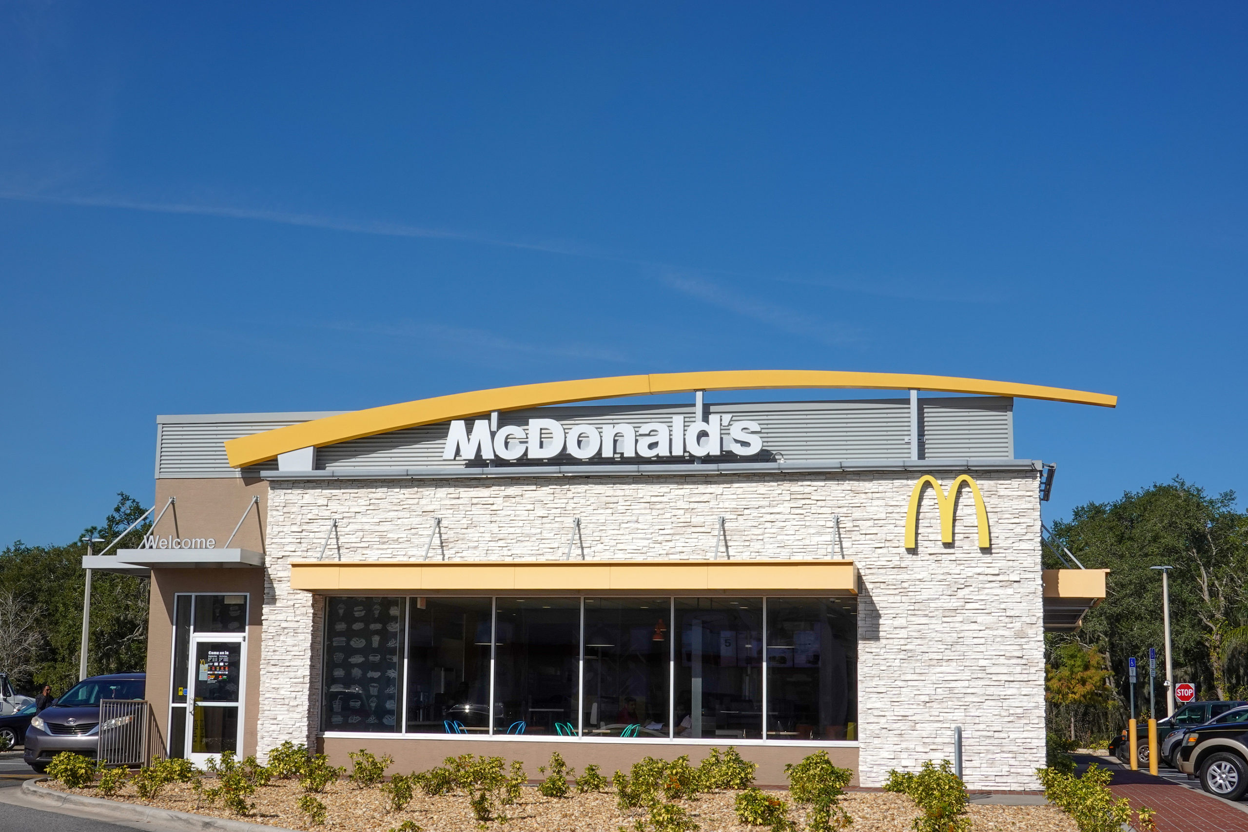 Orlando,FL USA - January 15, 2020:  The exterior of a McDonalds fast food restaurant on a bright sunny day in Orlando, Florida.